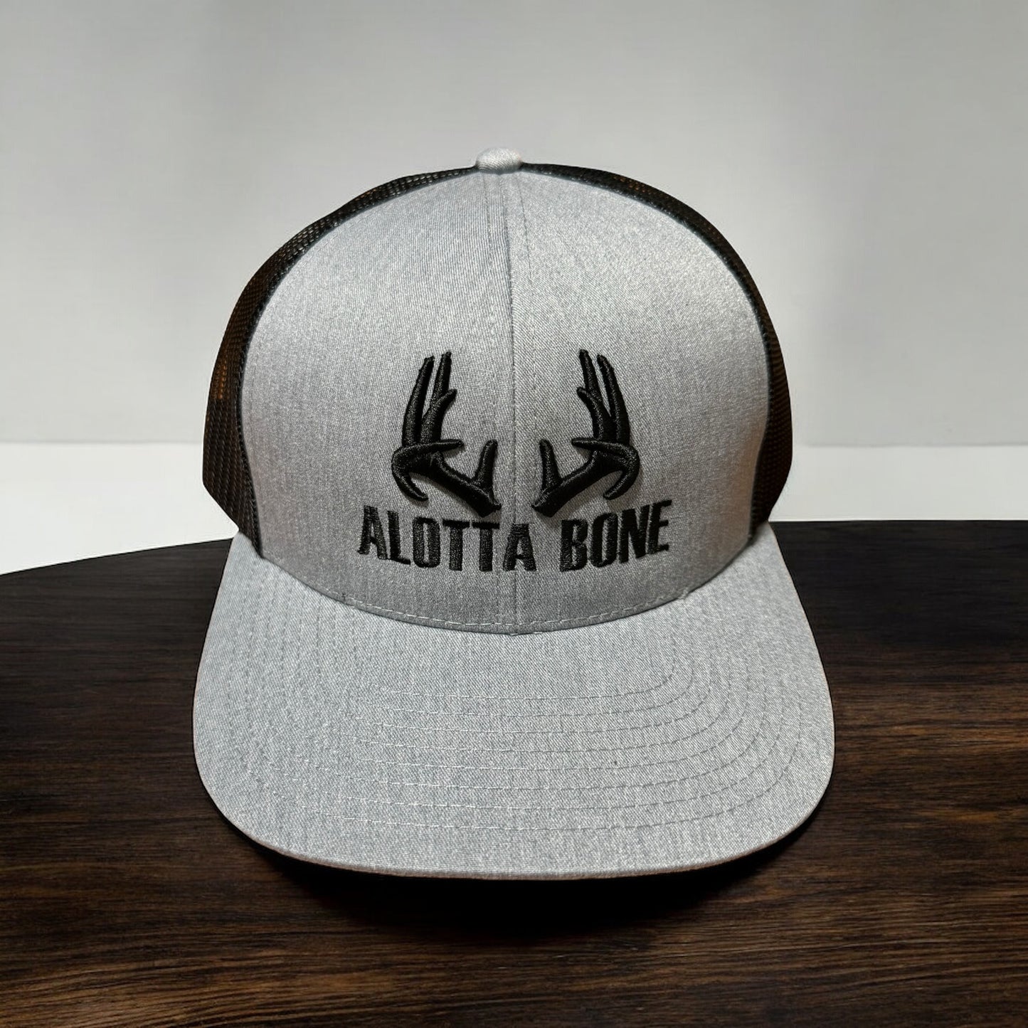 Alotta Bone Embroidered Trucker Hat- Grey/Black