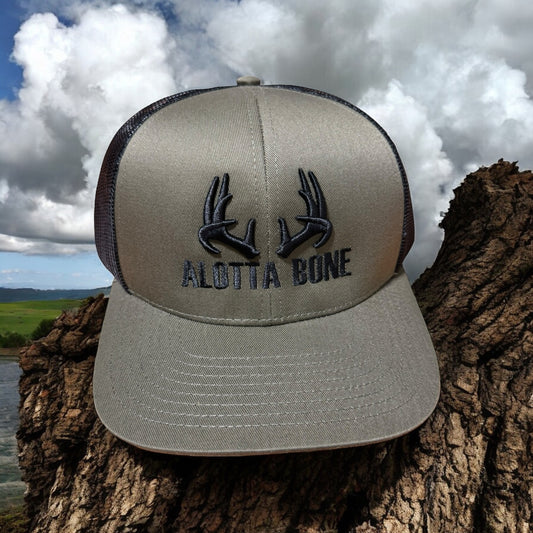 Alotta Bone Embroidered Trucker Hat- Hunter Green/ Black